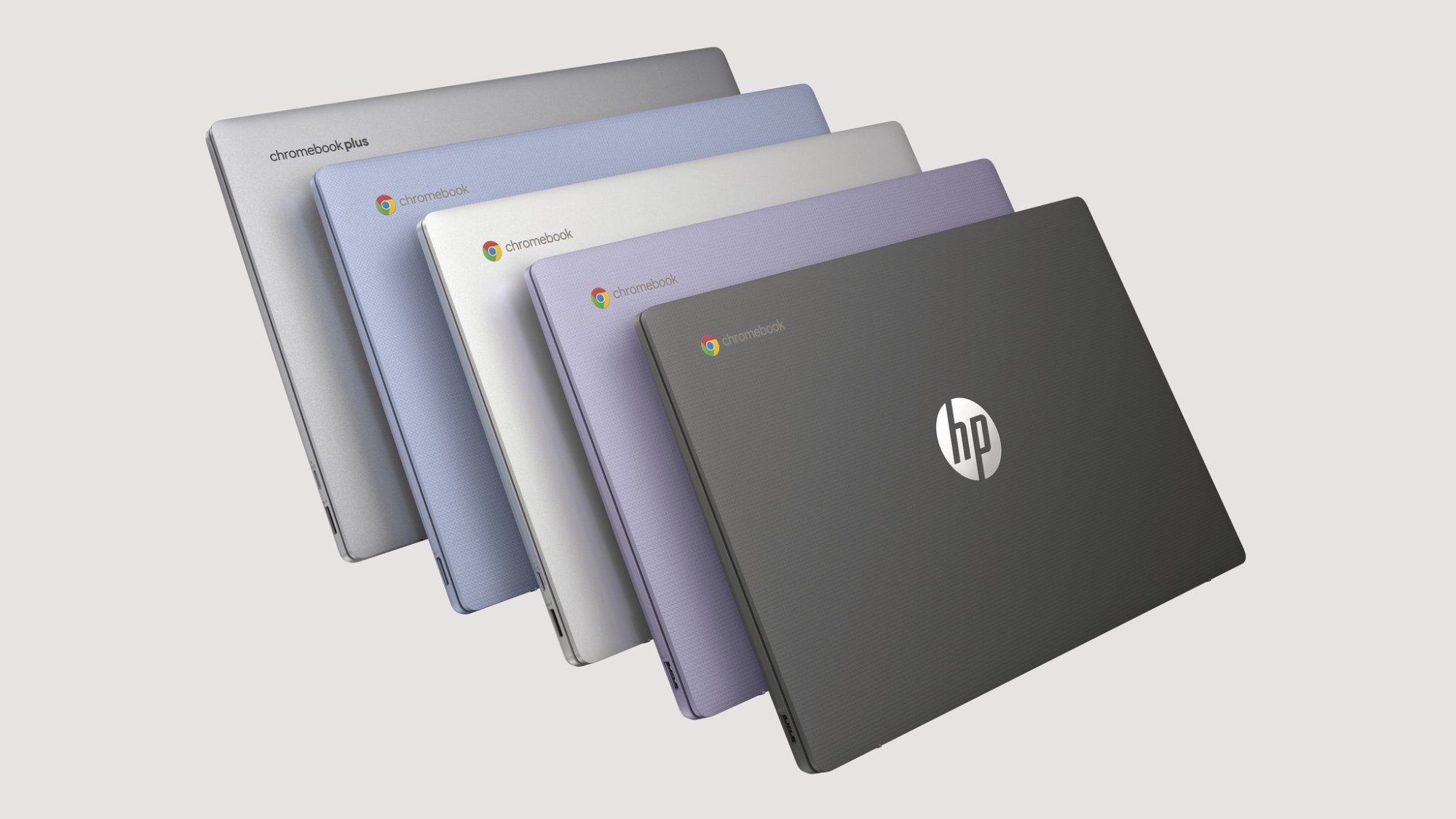 five different colors of the hp chromebook 14-inch lined up together against a light gray background