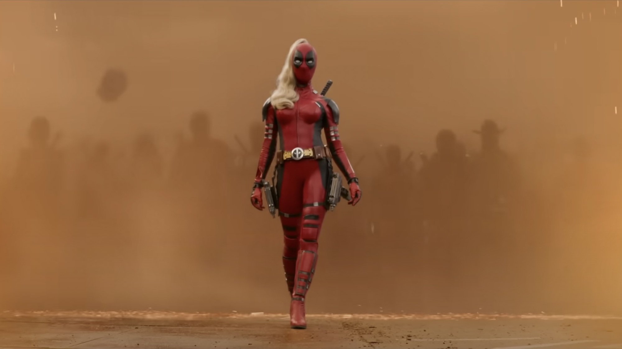 Ladypool and a horde of other Deadpool variants walk through a portal.