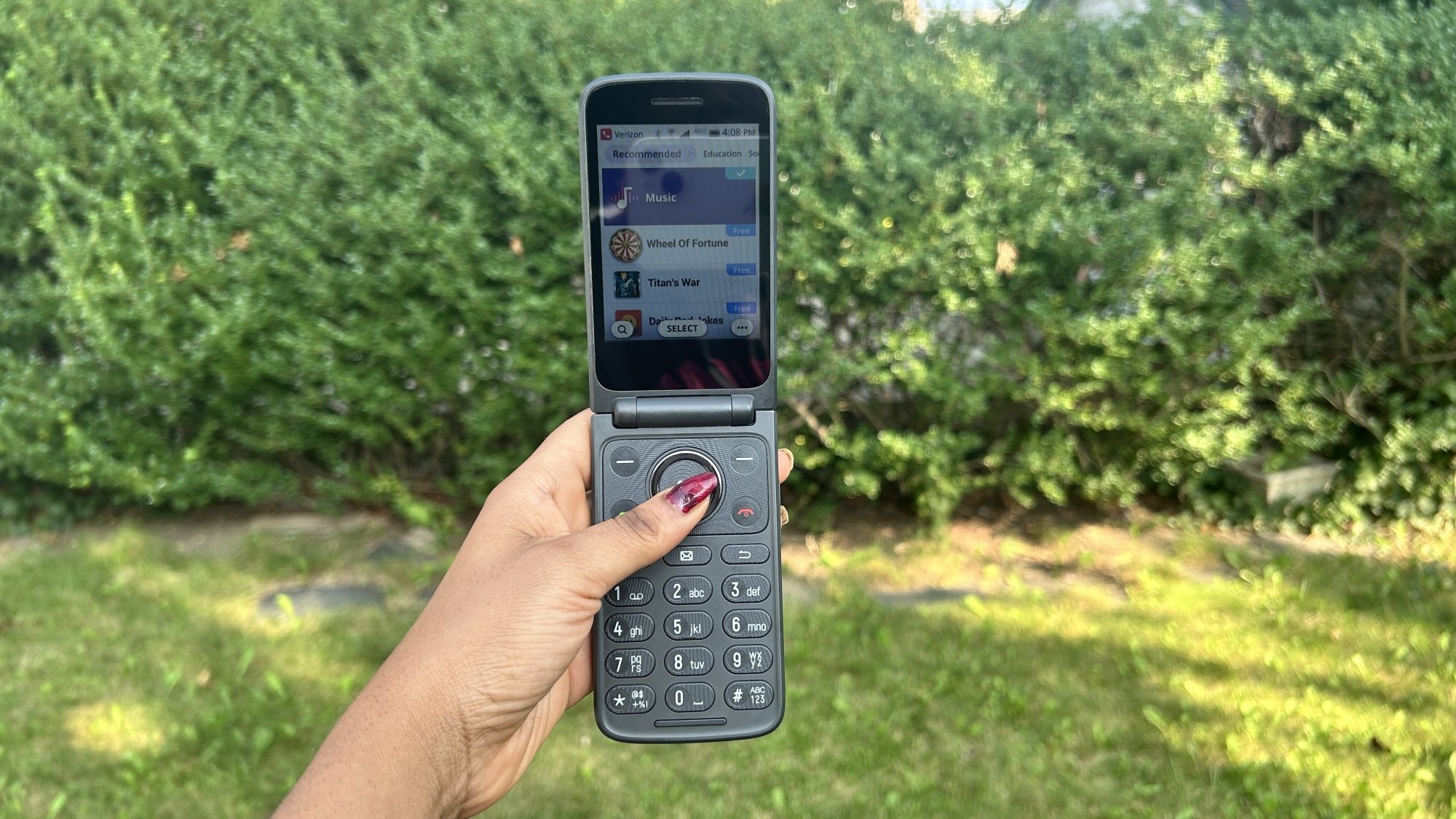 Woman holding TCL Flip 3