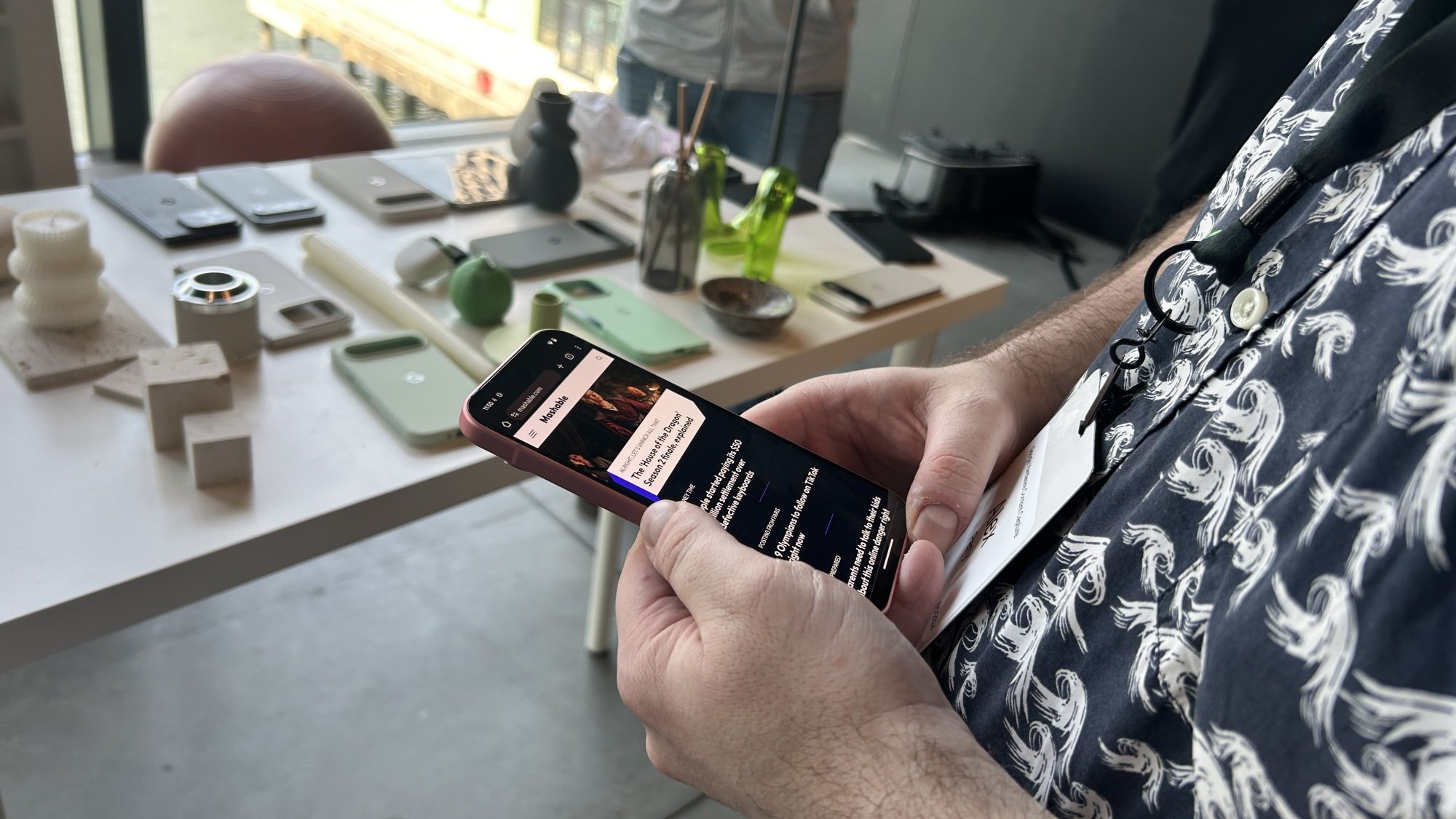 Google Pixel 9 in use showing Mashable web page