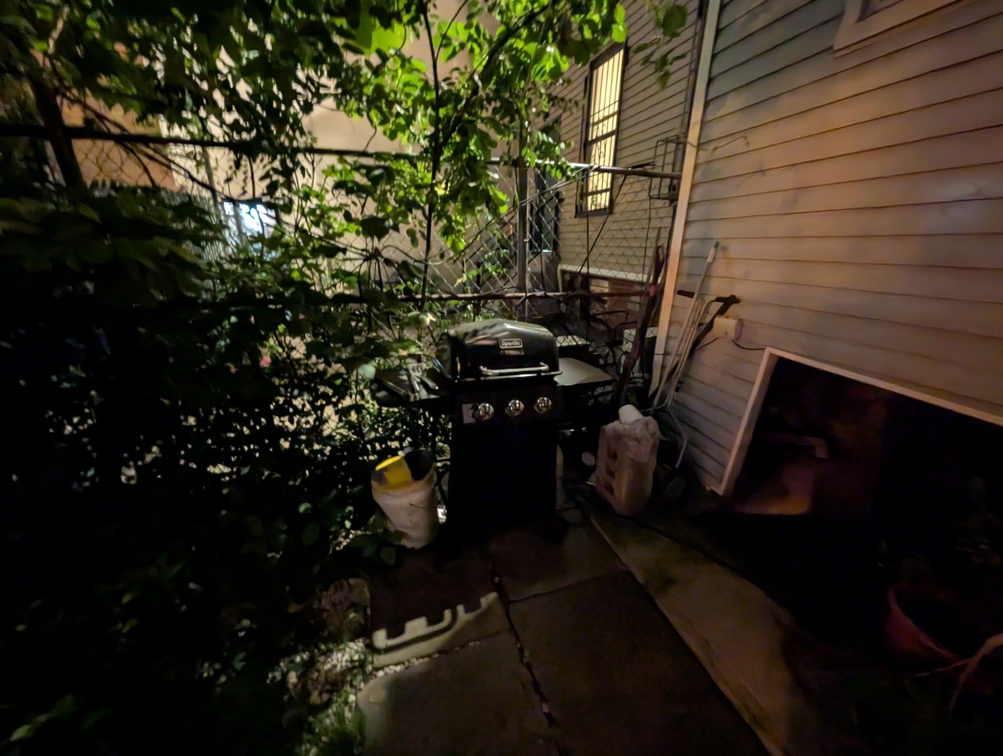 Backyard grill in low light shot with Pixel 9