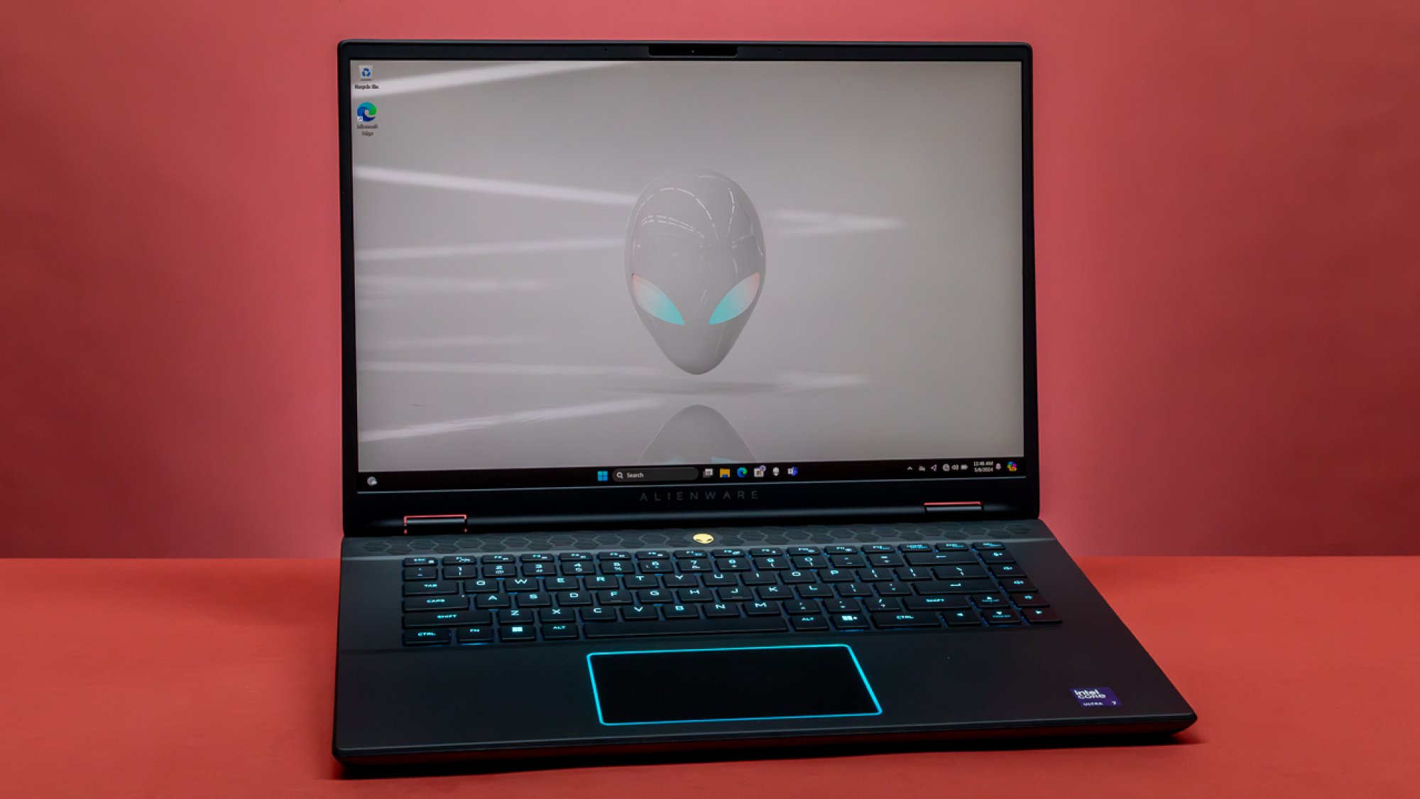 Alienware m16 r2 on red background