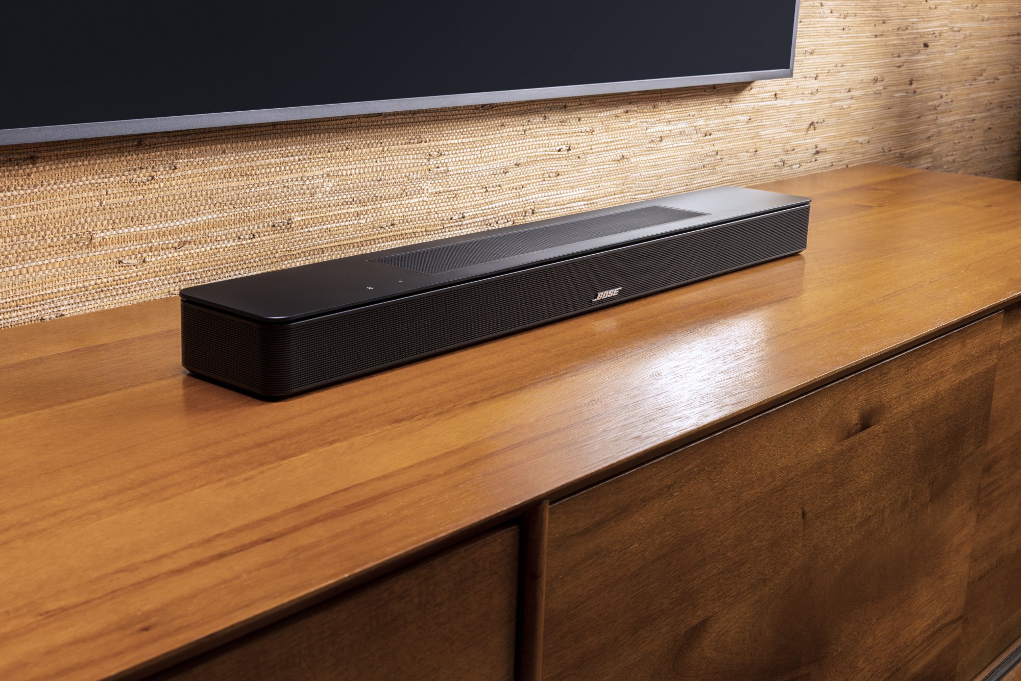 A Bose TV speaker on a TV console