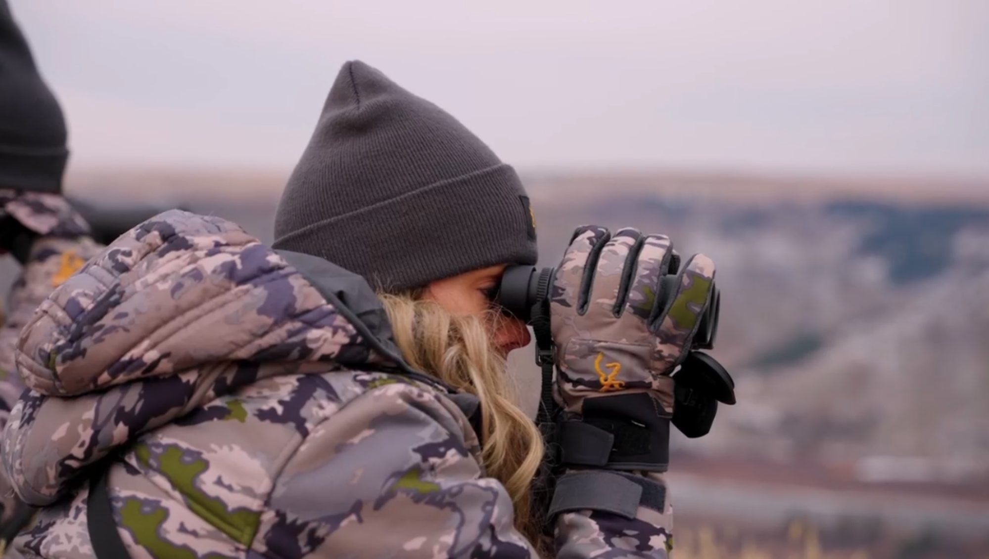 woman using binoculars