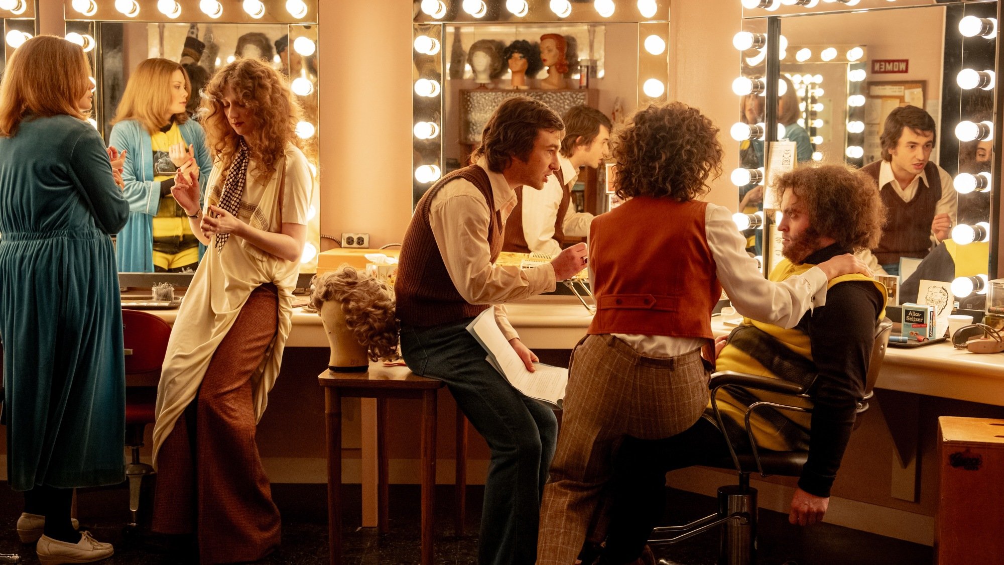 Jane Curtin (Kim Matula), Laraine Newman (Emily Fairn), Lorne Michaels (Gabriel LaBelle), Rosie Shuster (Rachel Sennott), and John Belushi (Matt Wood) in the Makeup Room in "Saturday Night."