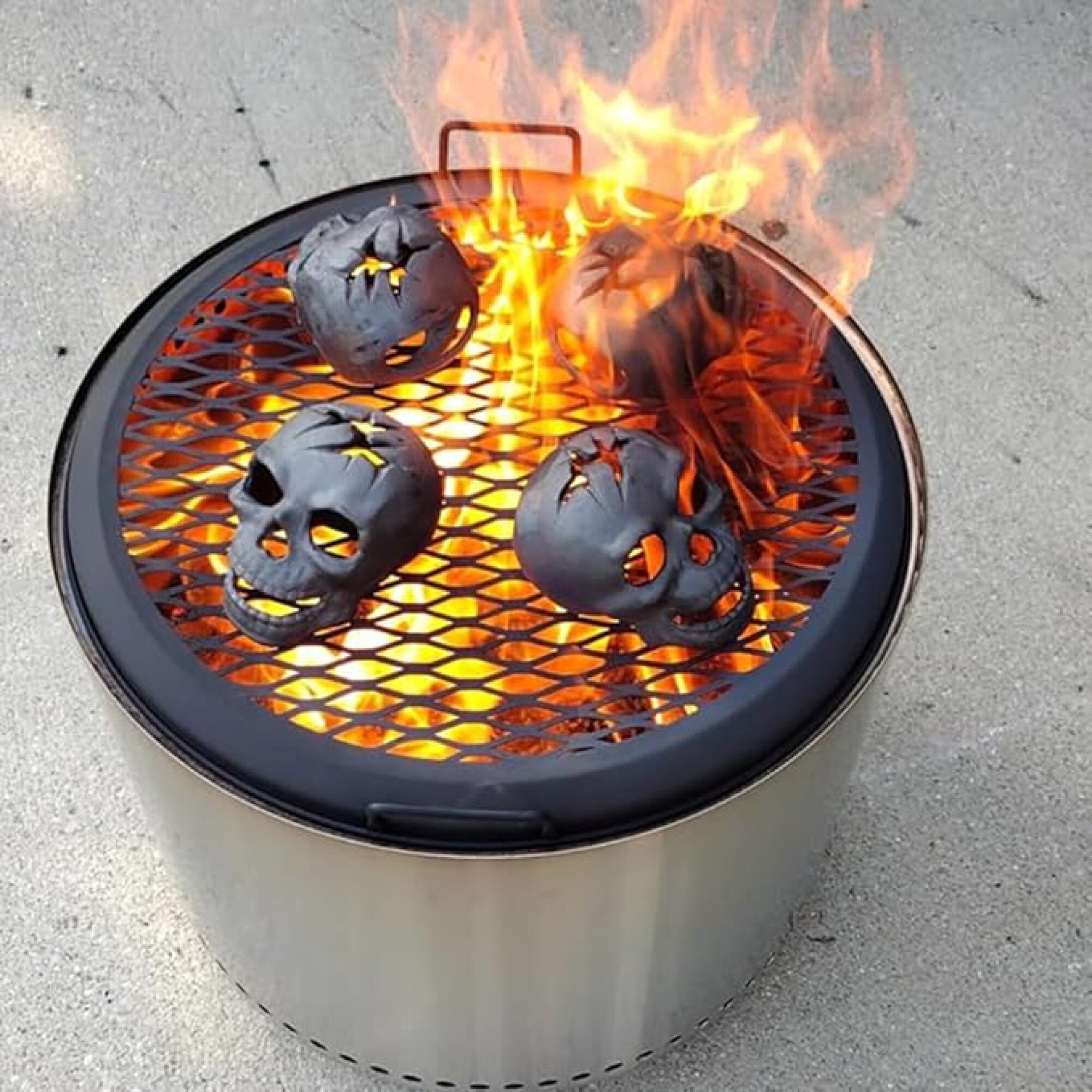 black skulls burning on a firepit