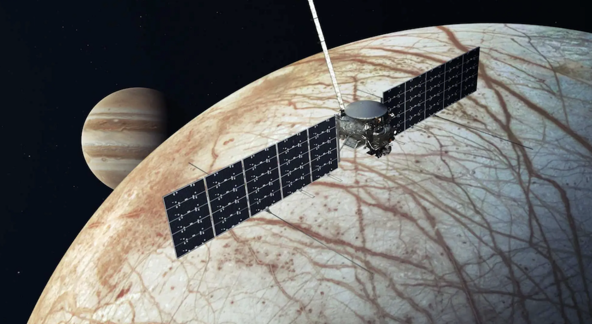 An artist's conception of the Europa Clipper spacecraft flying by the ice-covered moon Europa.